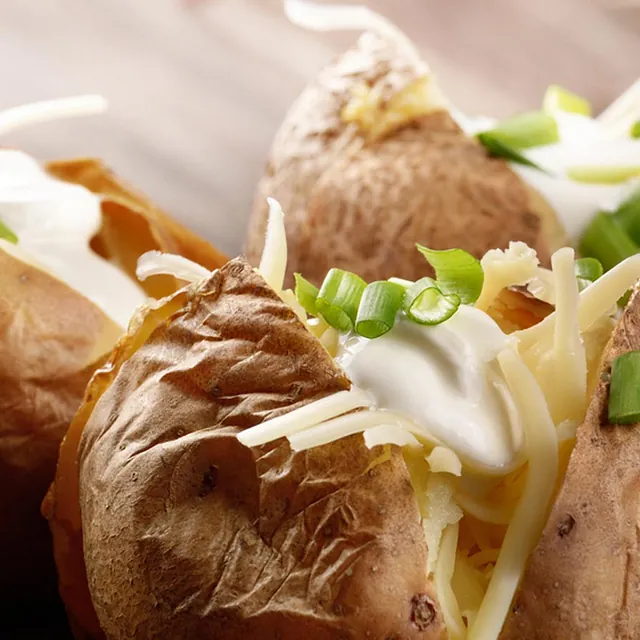 3 filled baked potatoes 